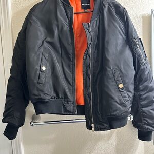 Black Bomber Jacket with Orange Lining